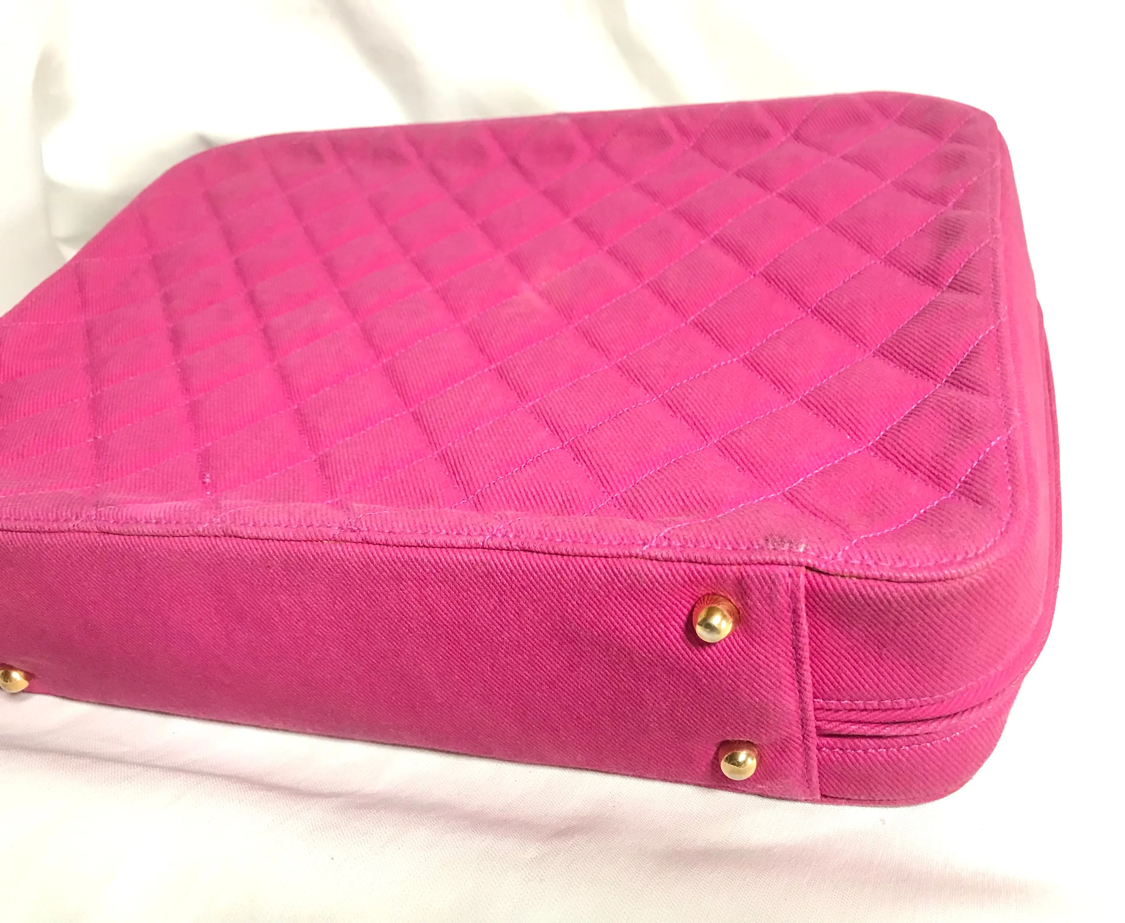 Vintage CHANEL pink canvas business bag style handbag with golden chain handle and a logo charm. Rare and collectible piece.